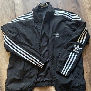 Adidas Woman’s  Black Windbreaker jacket size M